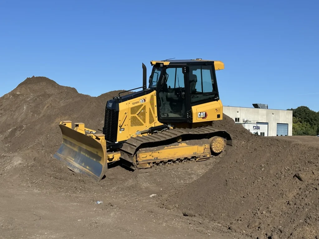 Tracked dozer on a graded earthwork site